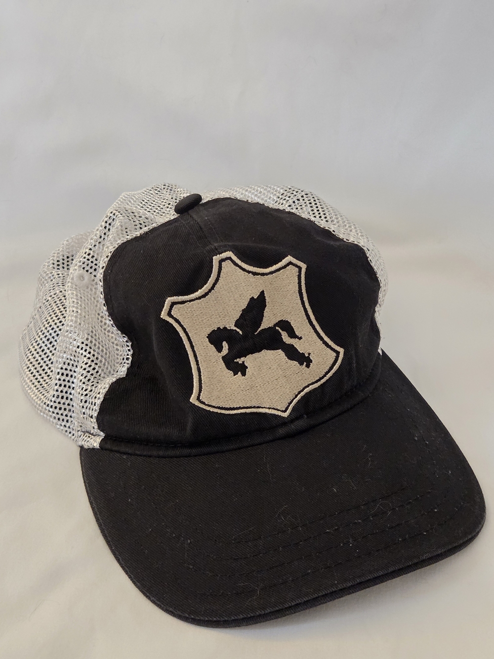 IDYLLWIND Black and White Mesh Trucker Hat with Pegasus Patch